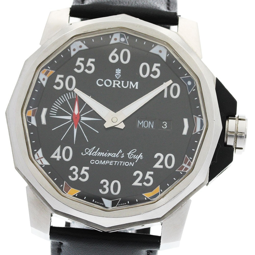 CORUM Admiral's Cup Competition 947.933.04 automatic day-date men's watch: CORUM Admiral's Cup Competition 947.933.04 automatic day-date men's watch CORUM Admiral's Cup Competition day-date automatic men's wristwatch with a black dial, stainless steel case, and leather after