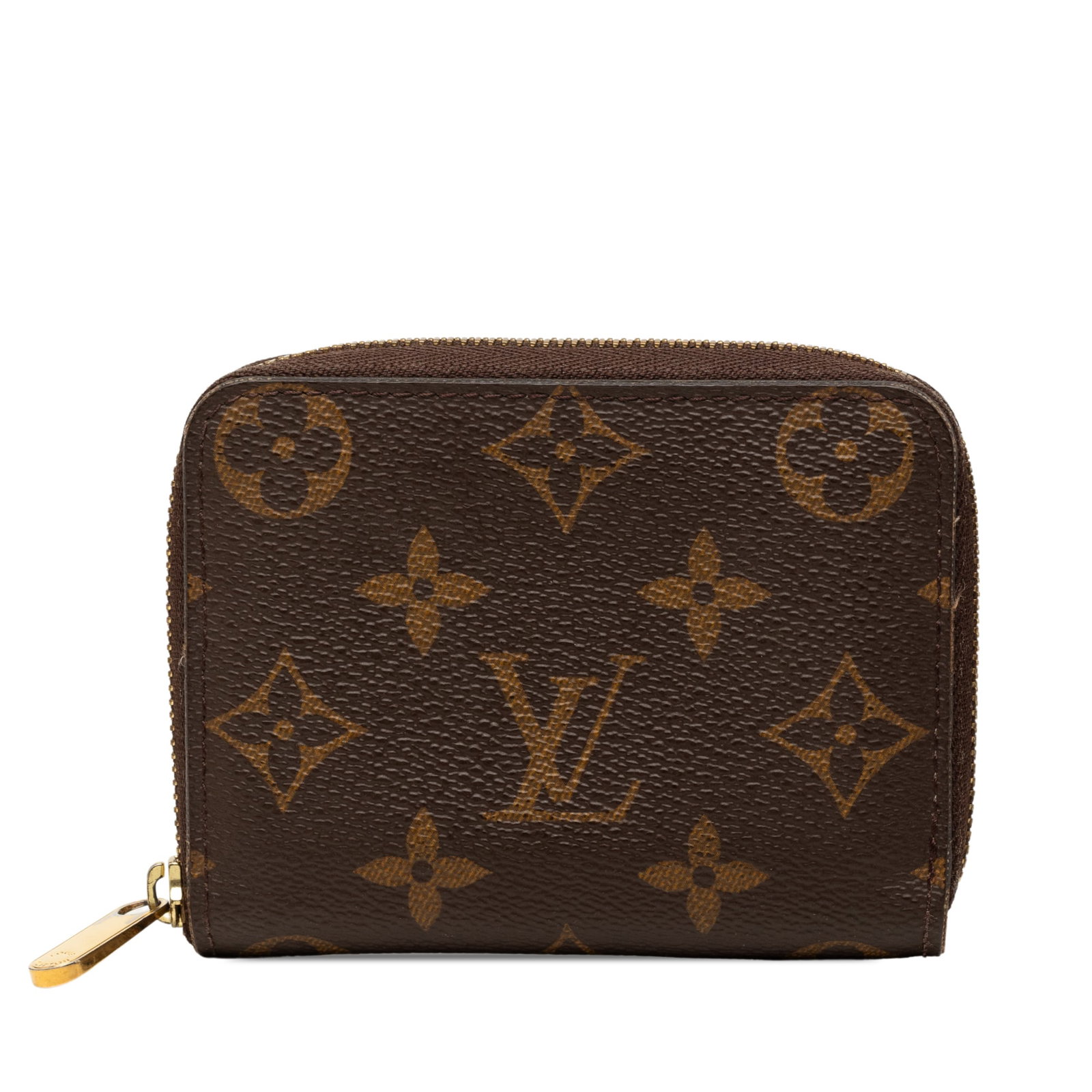 Louis Vuitton Zippy Coin Purse in Monogram Canvas: Louis Vuitton Zippy Coin Purse in Monogram Canvas Louis Vuitton Monogram Zippy Coin Purse in brown monogram canvas with a zip-around closure and interior slip pockets. Made in France. Condition is B+ 