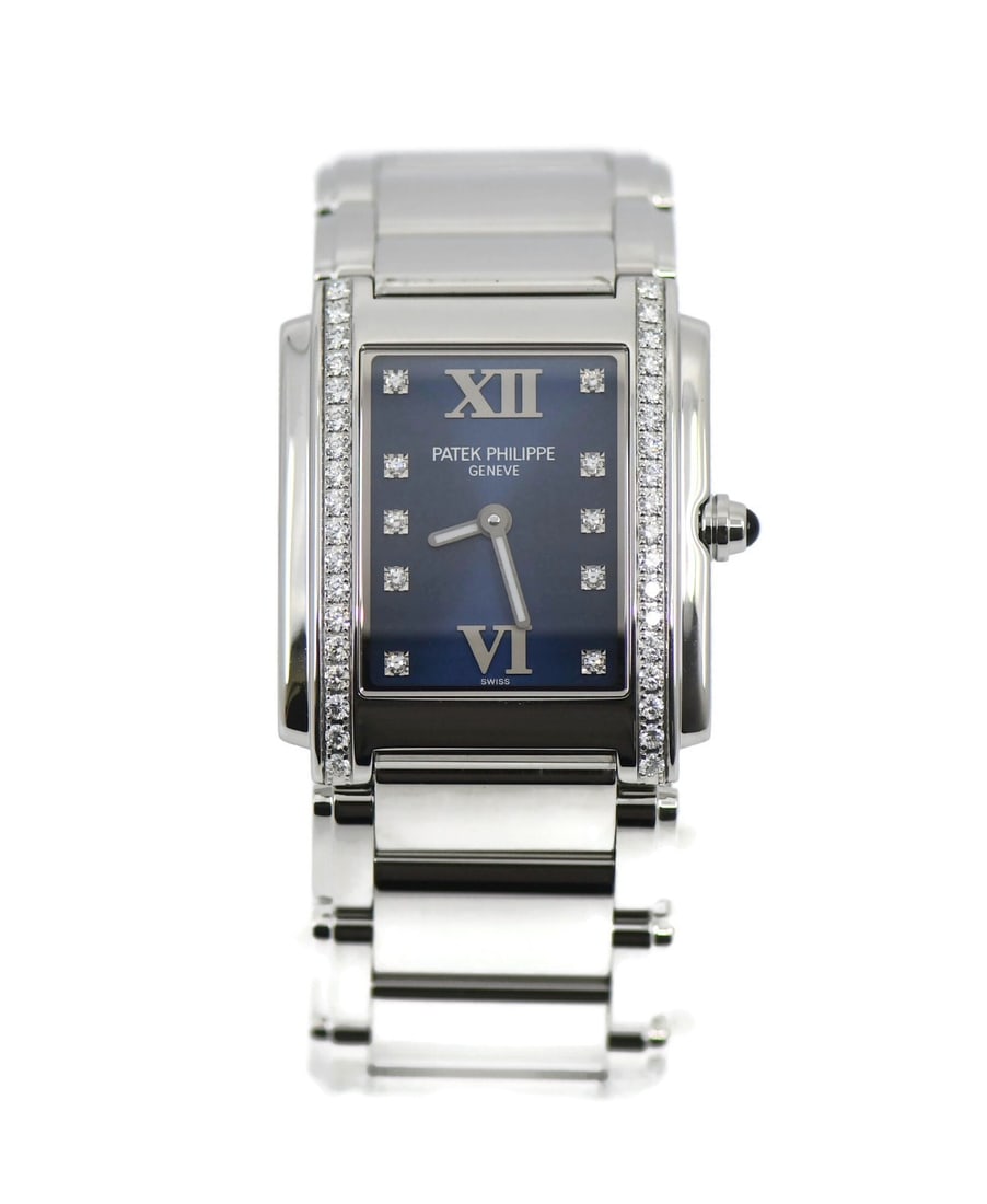 Patek Philippe Twenty 4 Blue Dial Diamond Quartz Watch 4910/10A-012 with Papers: Patek Philippe Twenty 4 Blue Dial Diamond Quartz Watch 4910/10A-012 with Papers This Patek Philippe Twenty-4 wristwatch features a stainless steel case and band, complemented by a blue analog dial. Th