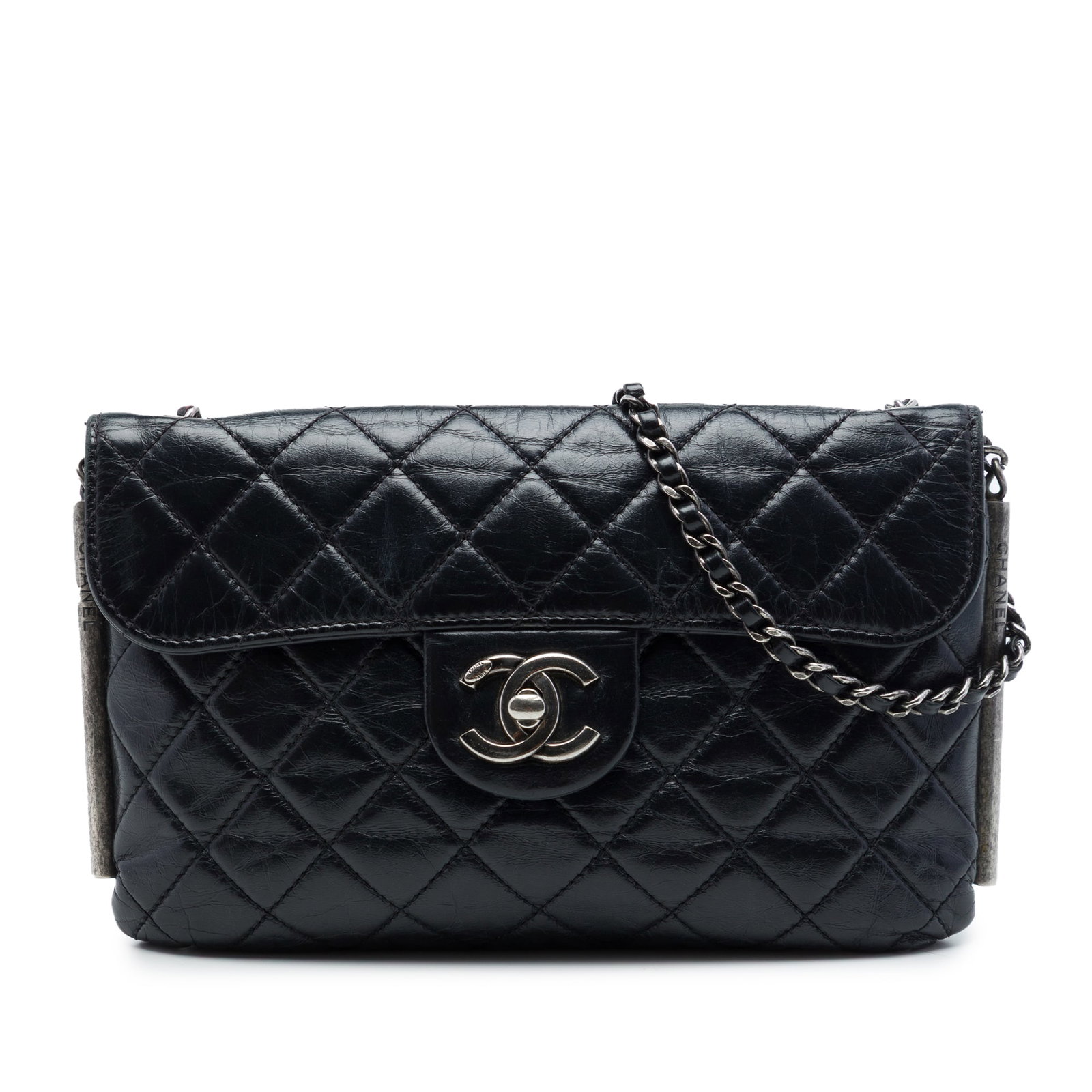 Chanel LAX Flap Black Quilted Aged Calfskin Shoulder Bag: Chanel LAX Flap Black Quilted Aged Calfskin Shoulder Bag A Chanel flap bag crafted in black quilted aged calfskin with embossed detailing. It features gunmetal hardware, a leather-woven chain link str