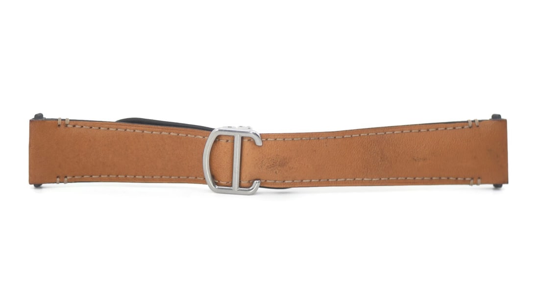 Cartier 21 mm Brown Leather Wristwatch Band: Cartier 21 mm Brown Leather Wristwatch Band Pre-owned Cartier wristwatch band in brown leather. Made in Switzerland, this strap offers a classic look for compatible watches. Specifications Brand: Cart