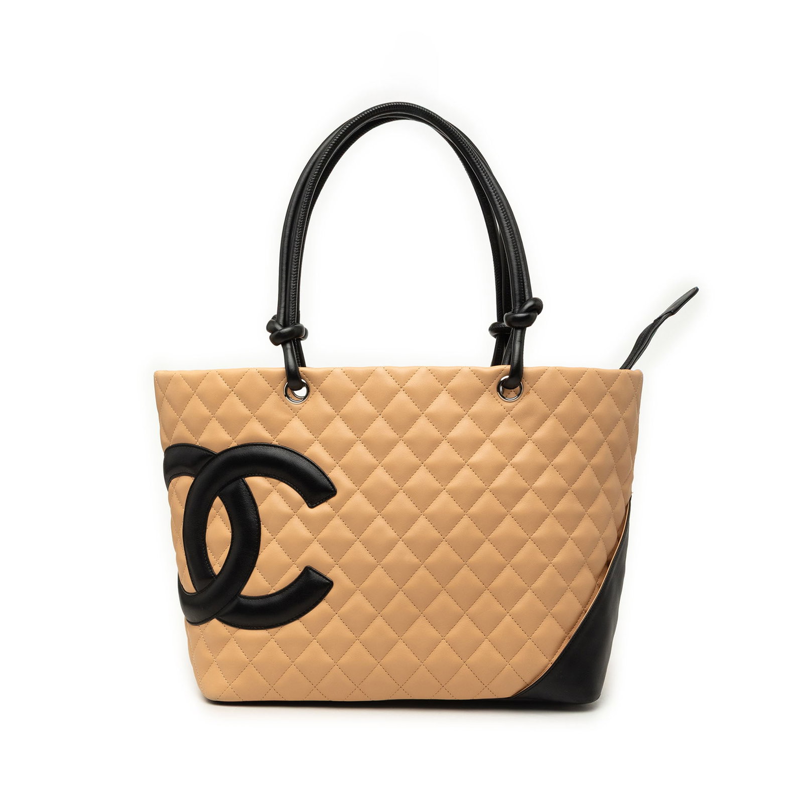 Chanel Cambon Ligne Large Quilted Lambskin Tote Bag Beige: Chanel Cambon Ligne Large Quilted Lambskin Tote Bag Beige A Chanel Cambon Ligne tote crafted in quilted lambskin leather with rolled leather handles and a top zip closure. This large tote includes an 