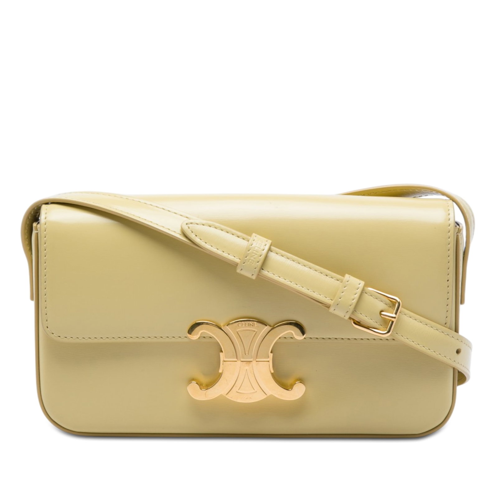 Celine Triomphe Claude Yellow Leather Shoulder Bag: Celine Triomphe Claude Yellow Leather Shoulder Bag A Celine Triomphe Claude shoulder bag crafted in shiny calfskin leather with a structured flap-front silhouette. It features an adjustable flat leath