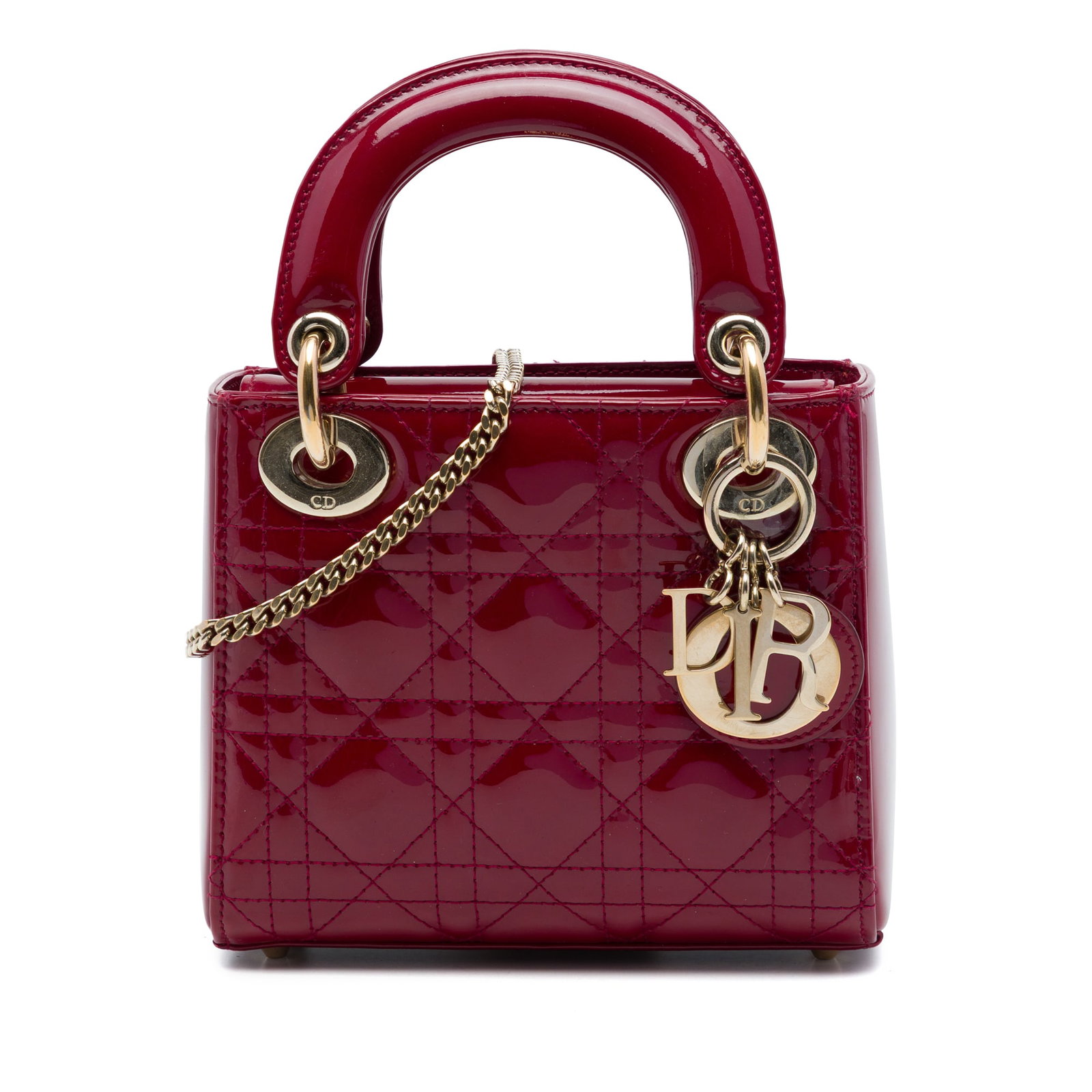 Dior Lady Dior Mini Cannage Patent Leather Handbag Red: Dior Lady Dior Mini Cannage Patent Leather Handbag Red A compact Lady Dior bag in red patent leather with the signature Cannage quilted design. It features flat top handles, a detachable chain link st