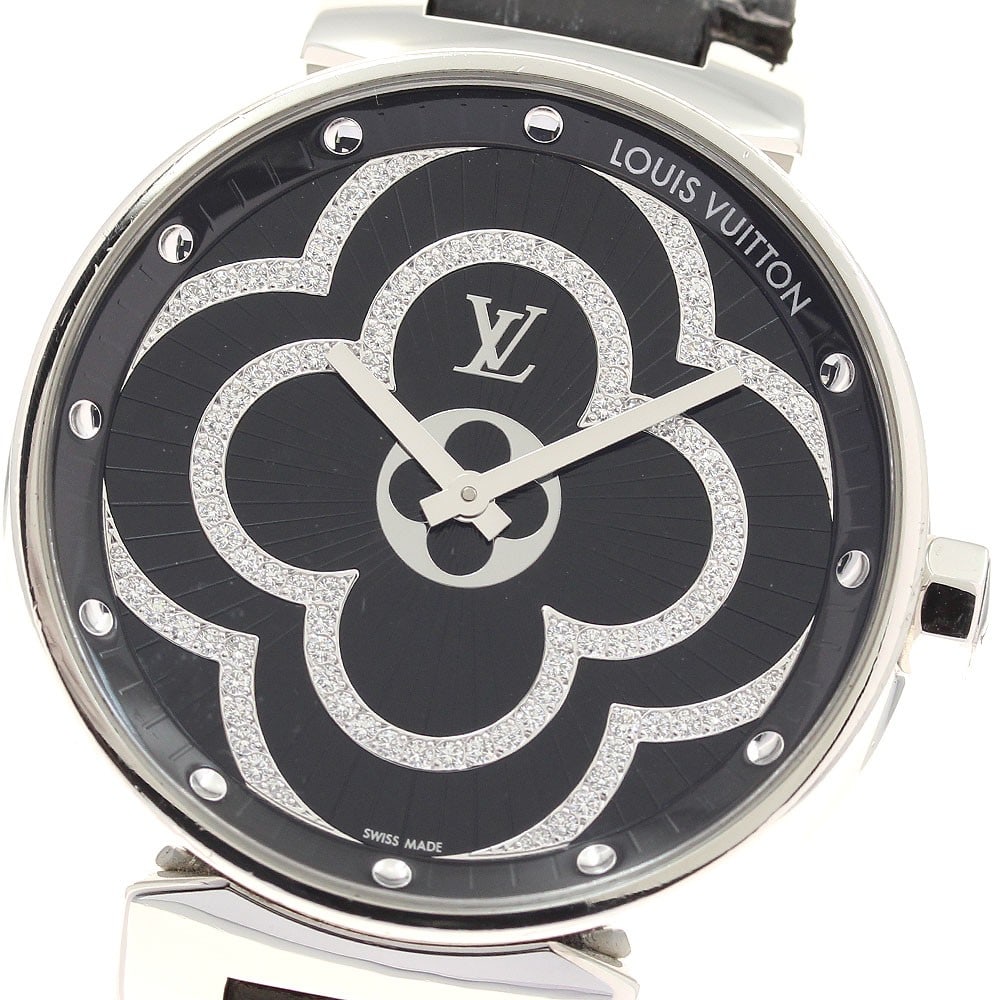 Louis Vuitton Tambour Moon Divine QA022 mens quartz wristwatch: Louis Vuitton Tambour Moon Divine QA022 mens quartz wristwatch Louis Vuitton Tambour Moon Divine men's wristwatch with a black dial and quartz movement. This Swiss-made watch features a stainless stee