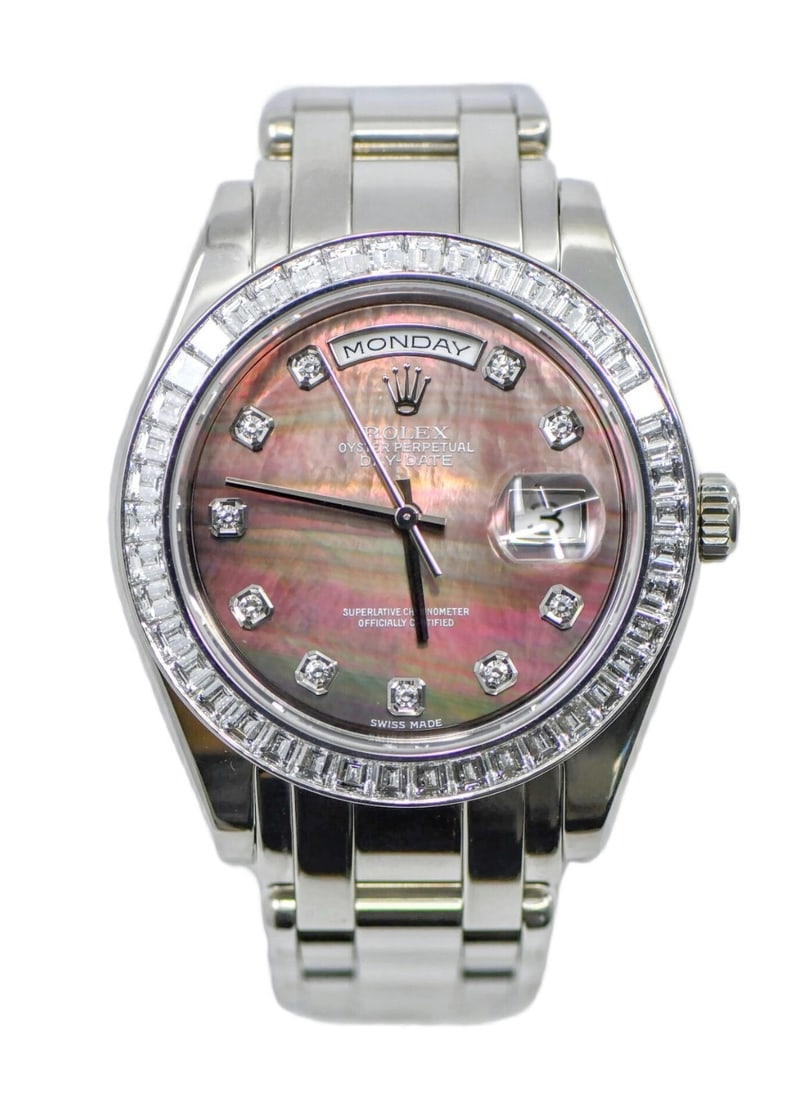 Rolex Day-Date 18956 platinum wristwatch with diamond bezel: Rolex Day-Date 18956 platinum wristwatch with diamond bezel Pre-owned Rolex Day-Date Masterpiece wristwatch with a platinum case and matching platinum band. This luxury automatic watch features a roun