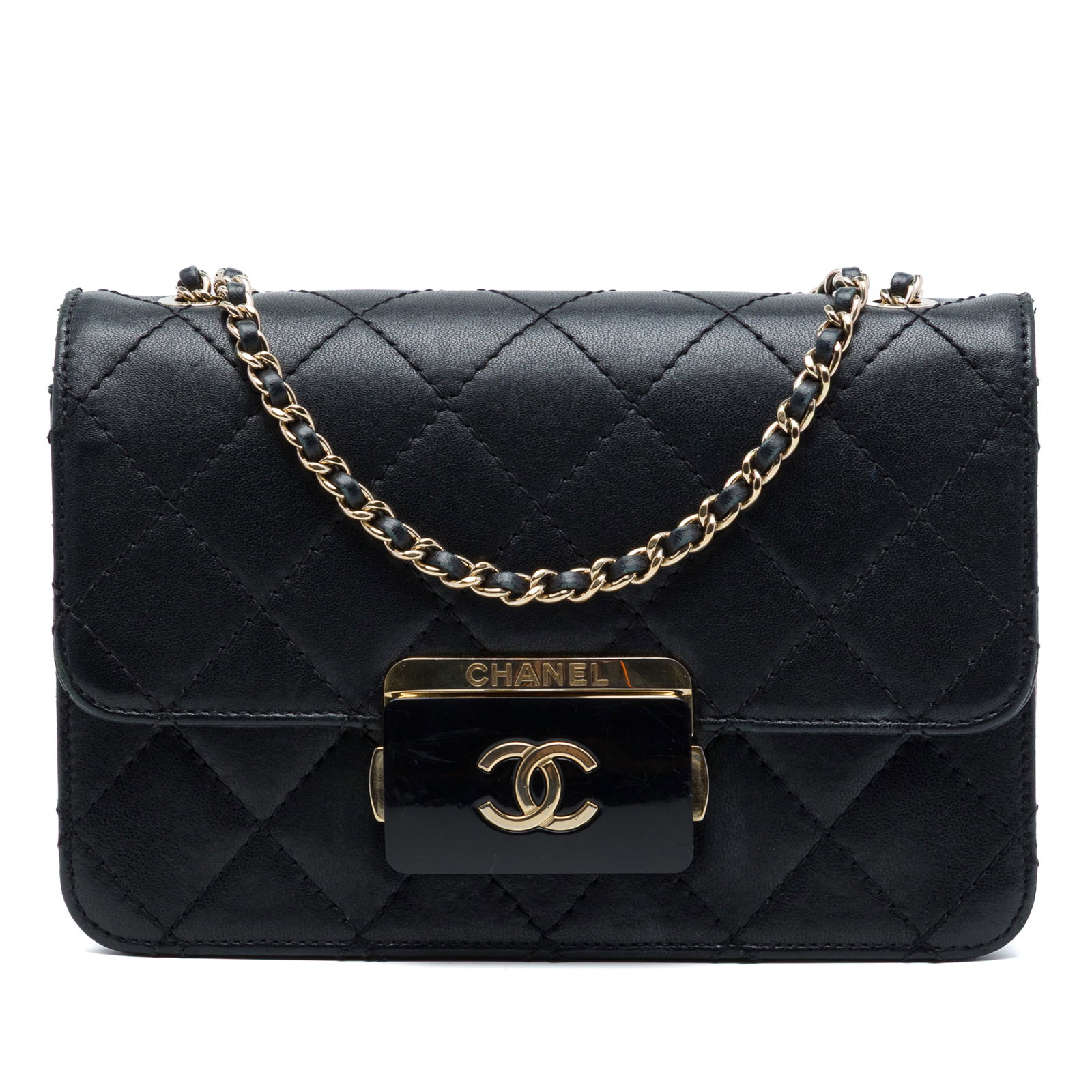 Chanel Beauty Lock Flap Mini Crossbody Bag in Black Sheepskin: Chanel Beauty Lock Flap Mini Crossbody Bag in Black Sheepskin Chanel Mini Sheepskin Beauty Lock Flap crossbody bag in black quilted sheepskin leather. It features a leather-woven chain link strap with