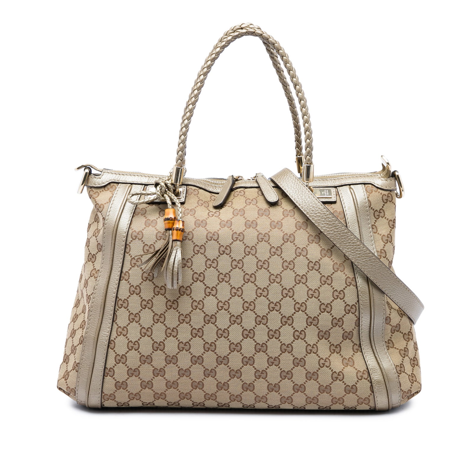 Gucci Bella Satchel Beige GG Canvas Handbag with Leather Trim: Gucci Bella Satchel Beige GG Canvas Handbag with Leather Trim Gucci Bella satchel in beige GG canvas with leather trim and braided leather handles. This satchel includes a detachable flat leather stra