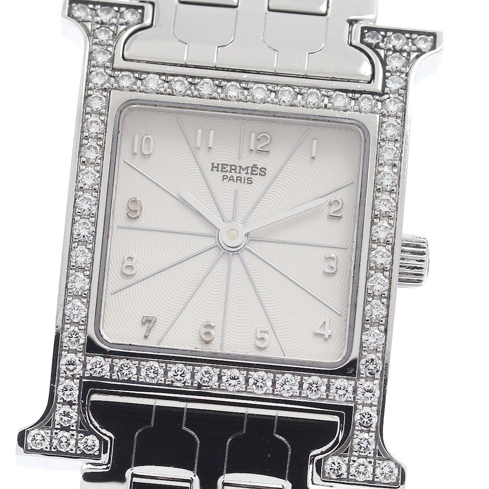 Hermes H-Watch HH1.230 Womens Quartz Wristwatch Diamond Bezel: Hermes H-Watch HH1.230 Womens Quartz Wristwatch Diamond Bezel Hermes H-Watch women's wristwatch with a diamond bezel and quartz movement. This watch features a silver dial in a stainless steel case wi