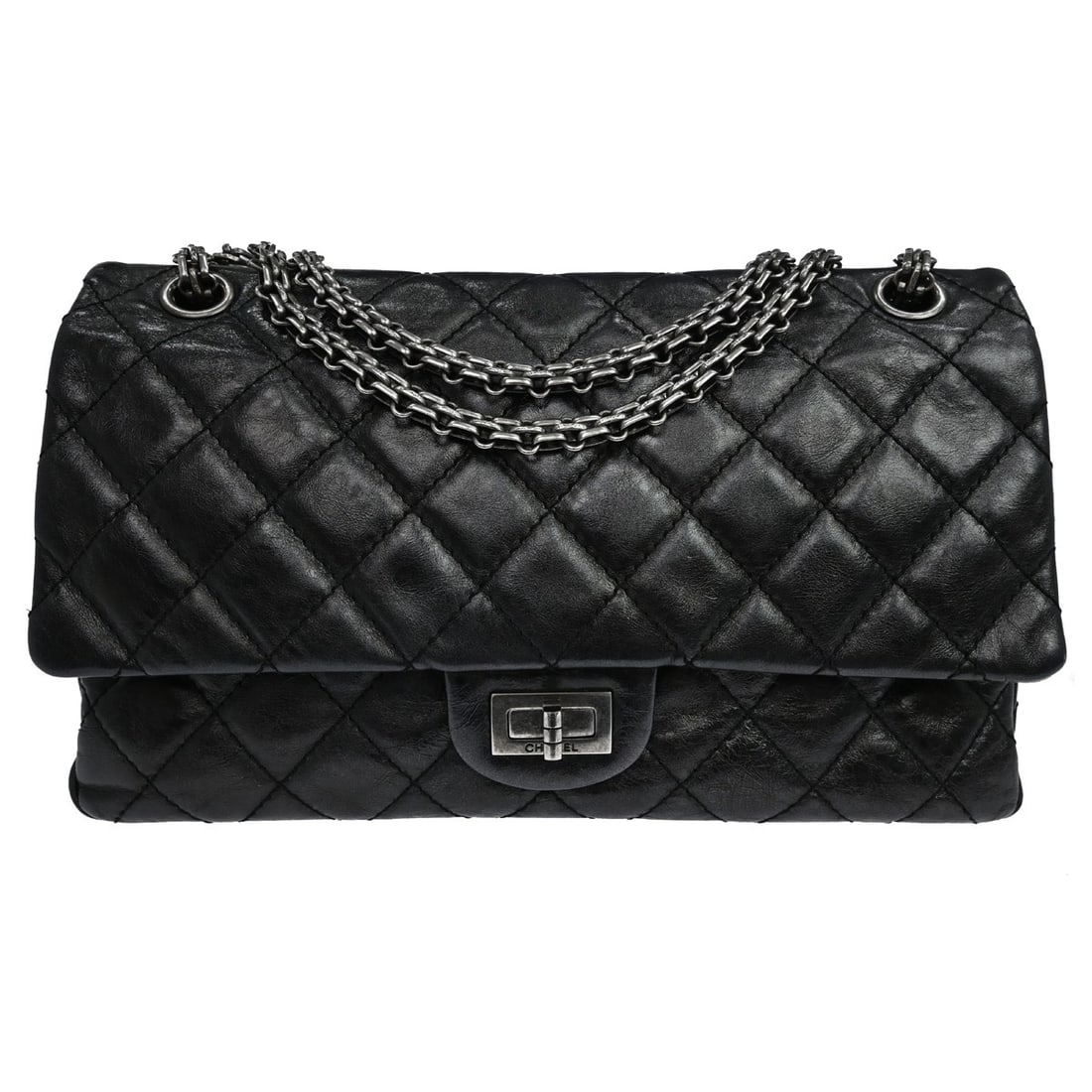 Chanel Reissue 2.55 Flap Bag in Black Leather: Chanel Reissue 2.55 Flap Bag in Black Leather A Chanel Reissue 2.55 Flap bag in black leather with the classic quilted design. Made in France, this piece is presented in good condition with light scuf