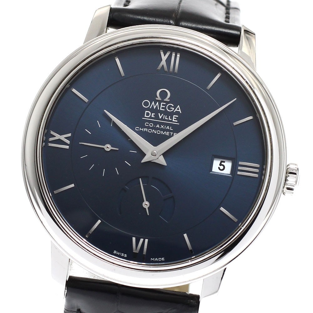 OMEGA De Ville Prestige 424.13.40.21.03.001 automatic watch power reserve date: OMEGA De Ville Prestige 424.13.40.21.03.001 automatic watch power reserve date OMEGA De Ville Prestige automatic wristwatch with a navy dial and stainless steel case. This men's watch features date, s