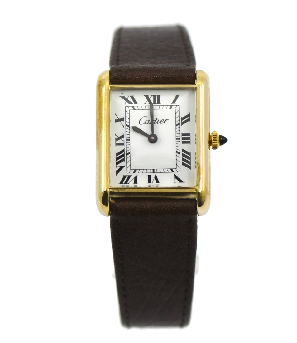Cartier Tank Women's Manual Wristwatch Gold Plated Leather Band: Cartier Tank Women's Manual Wristwatch Gold Plated Leather Band Pre-owned Cartier Tank wristwatch with a classic analog display and manual mechanical movement. This women's watch features a white dial