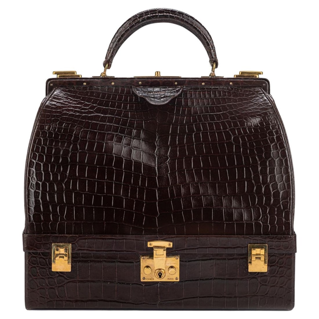 Hermes Vintage Brown Croc Doctor Bag 1950s Gold Tone Hardware: Hermes Vintage Brown Croc Doctor Bag 1950s Gold Tone Hardware This exquisite Hermes vintage doctor's bag is a rare collectible piece, crafted from luxurious shiny brown crocodile leather. The bag feat