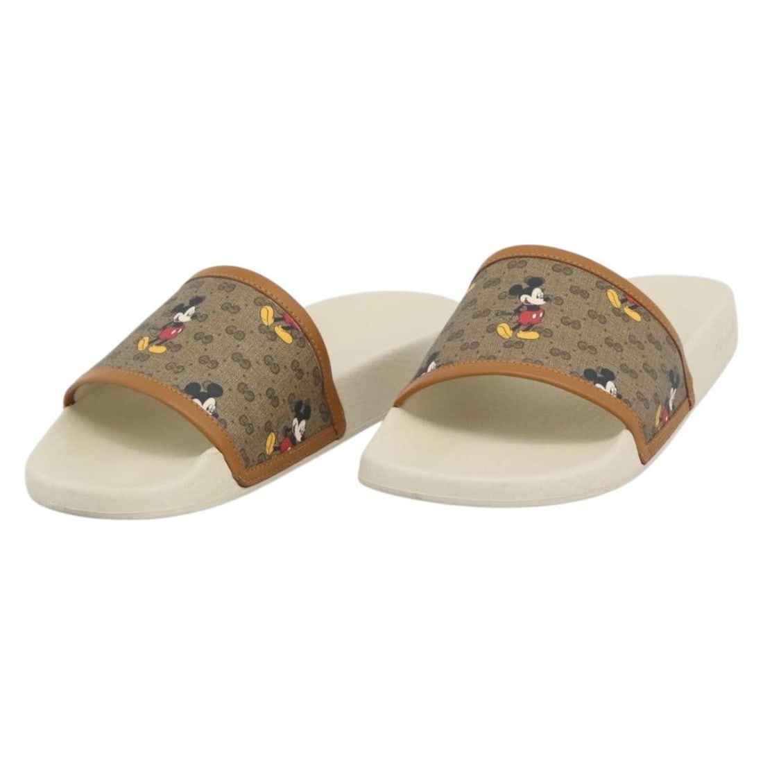 Gucci 603702 Beige PVC Leather Micro GG Womens Sandals: Gucci 603702 Beige PVC Leather Micro GG Womens Sandals Gucci Disney MicroGG sandals in beige, crafted with PVC leather and Micro Small GG canvas. This women's pair comes with the dust bag and item box