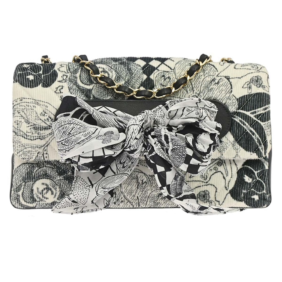 CHANEL Choco Bar Shoulder Bag Black White Silk Corduroy Turn Lock: CHANEL Choco Bar Shoulder Bag Black White Silk Corduroy Turn Lock Chanel shoulder bag in black and white silk and corduroy chevron design. It features a turn lock closure, leather lining, a leather ha