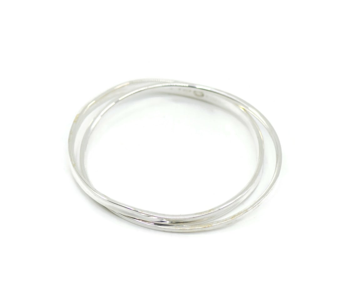 Georg Jensen 925 Sterling Bangle Bracelet Denmark: Georg Jensen 925 Sterling Bangle Bracelet Denmark Sterling silver Georg Jensen bangle bracelet with a 925 metal purity and no stone. It is a pre-owned piece made in Denmark, with a width of 7 inches, 