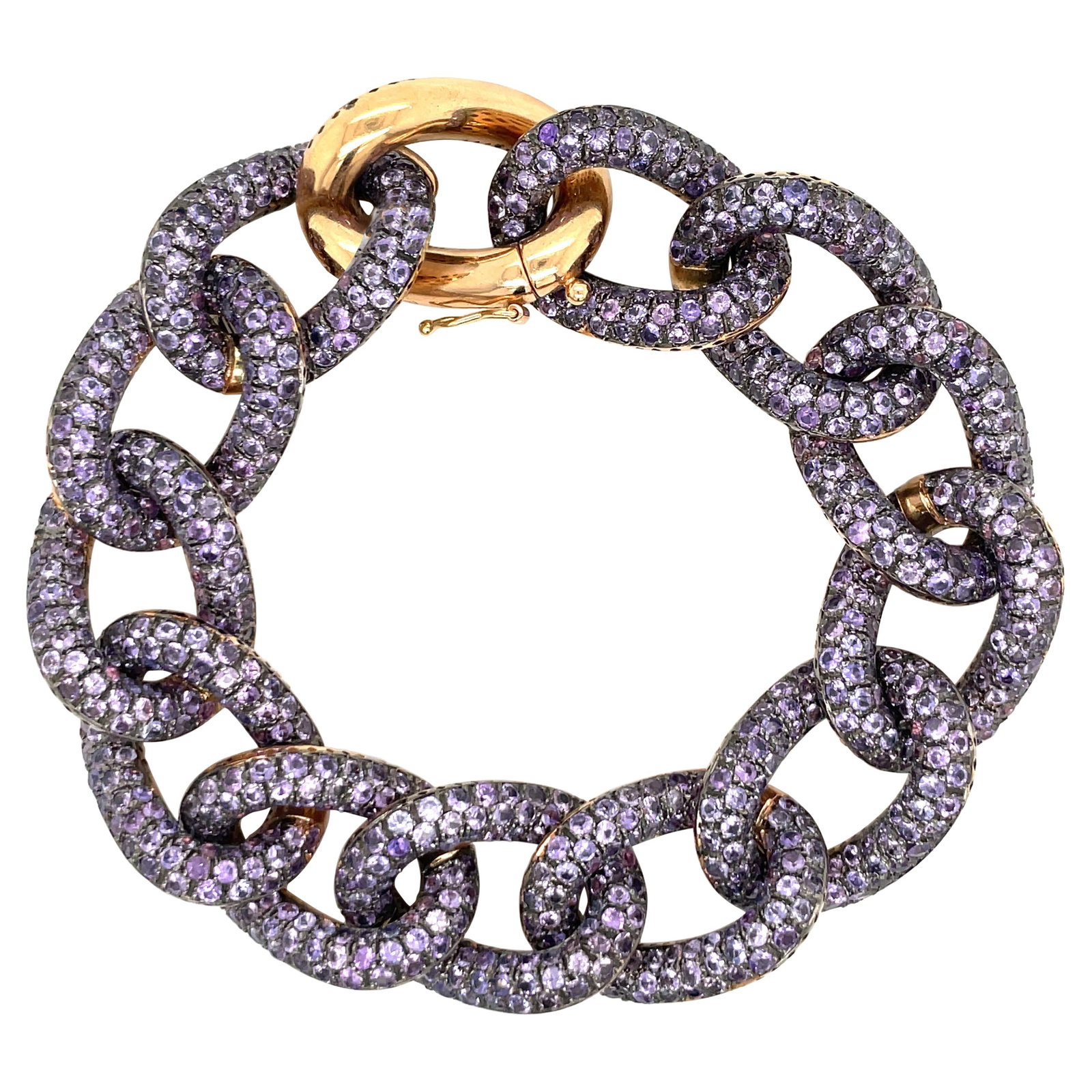 Italy Made 18k Yellow Gold Amethyst Cuban Link Bracelet 75g: Italy Made 18k Yellow Gold Amethyst Cuban Link Bracelet 75g Contemporary Cuban link bracelet crafted in 18 karat yellow gold and set with numerous round-cut amethysts. Made in Italy, this bracelet has