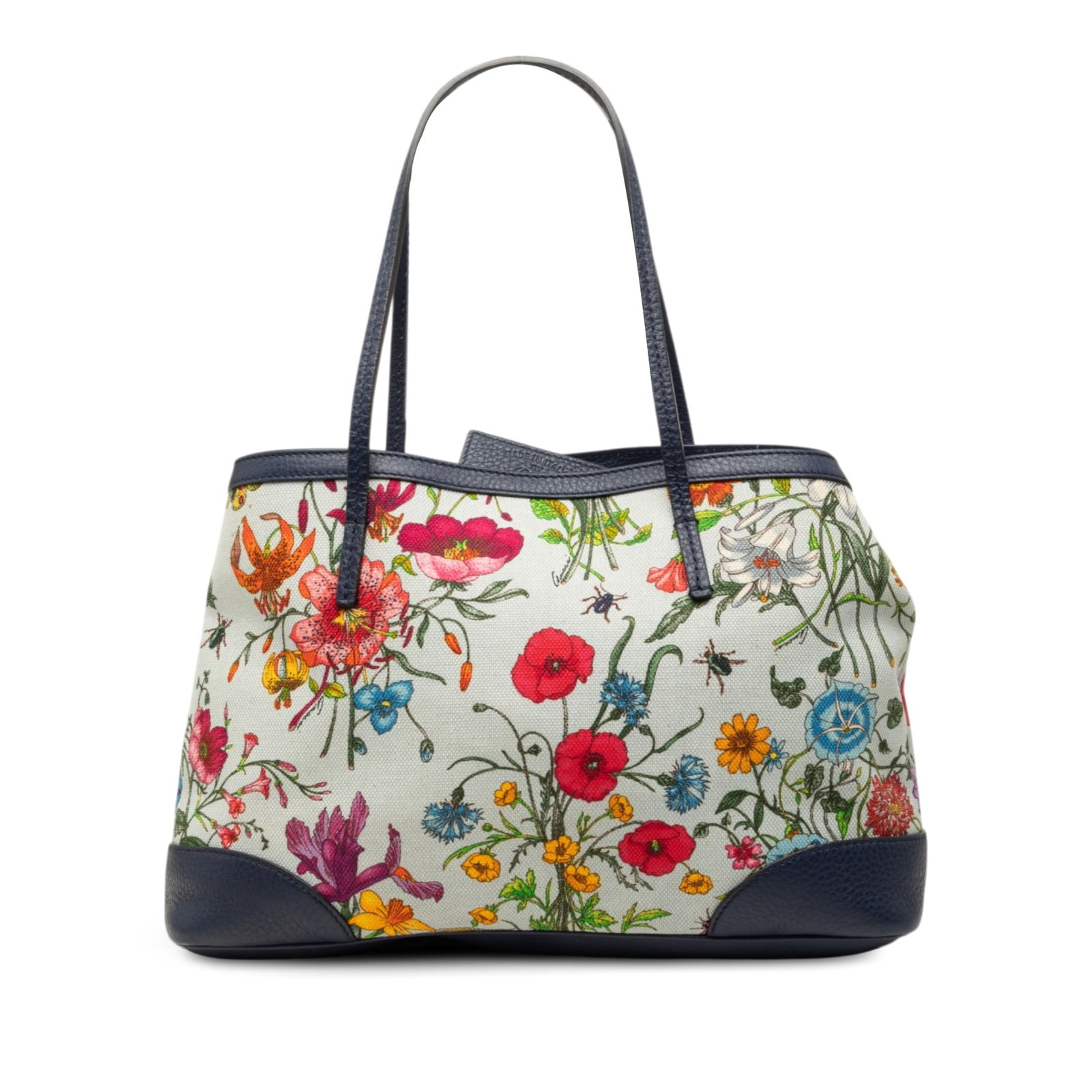Gucci Flora Medium Tote Bag in Printed Canvas with Leather Trim: Gucci Flora Medium Tote Bag in Printed Canvas with Leather Trim Gucci Medium Canvas Flora Tote with a printed canvas body and leather trim. It features flat leather shoulder straps, an open top with a