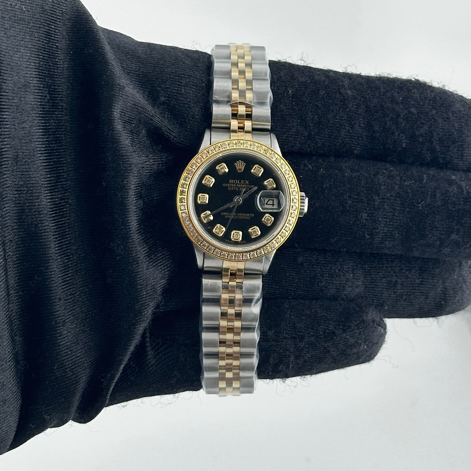 Rolex Datejust 6517 ladies watch aftermarket black diamond dial bracelet: Rolex Datejust 6517 ladies watch aftermarket black diamond dial bracelet Ladies Rolex Datejust reference 6517 featuring an Aftermarket black diamond dial, a pave YG plated diamond bezel, and an Afterm