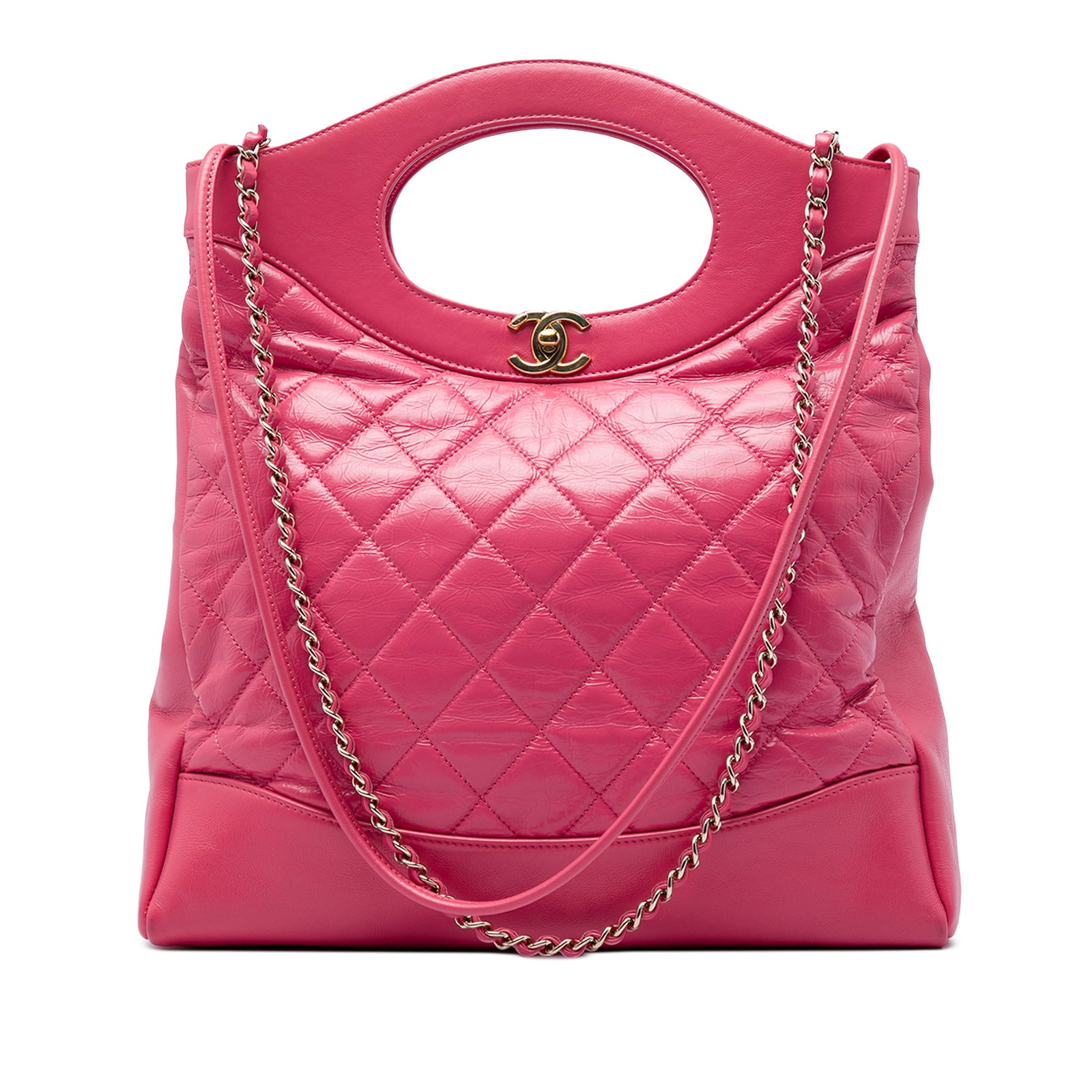 Chanel 31 Shopping Bag Small Quilted Aged Calfskin Pink: Chanel 31 Shopping Bag Small Quilted Aged Calfskin Pink A Chanel 31 shopping bag in pink shiny aged calfskin with a quilted design. This satchel features flat cutout handles, rolled leather and leathe
