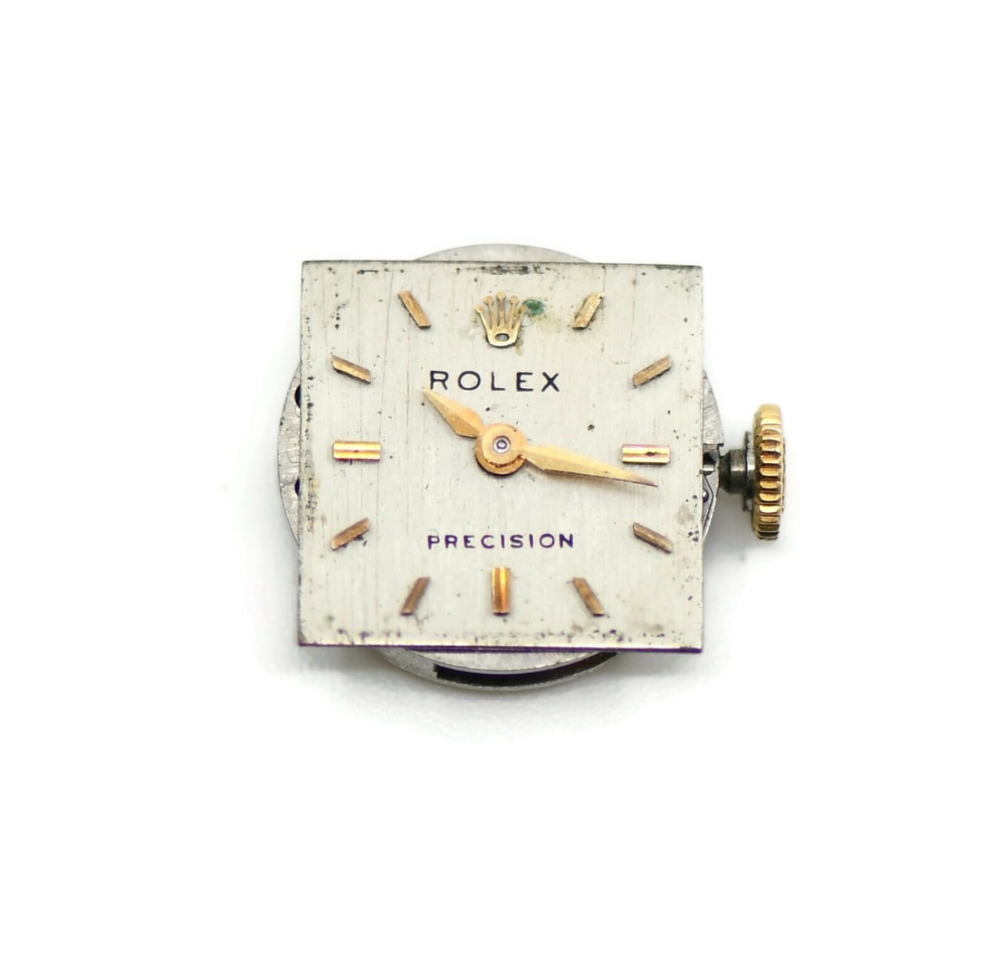 Rolex Caliber 1401 manual movement for Precision: Rolex Caliber 1401 manual movement for Precision Pre-owned Rolex Cal. 1401 manual mechanical movement for a Rolex Precision. This authentic Swiss-made watch movement measures 12.4 mm and is being sold