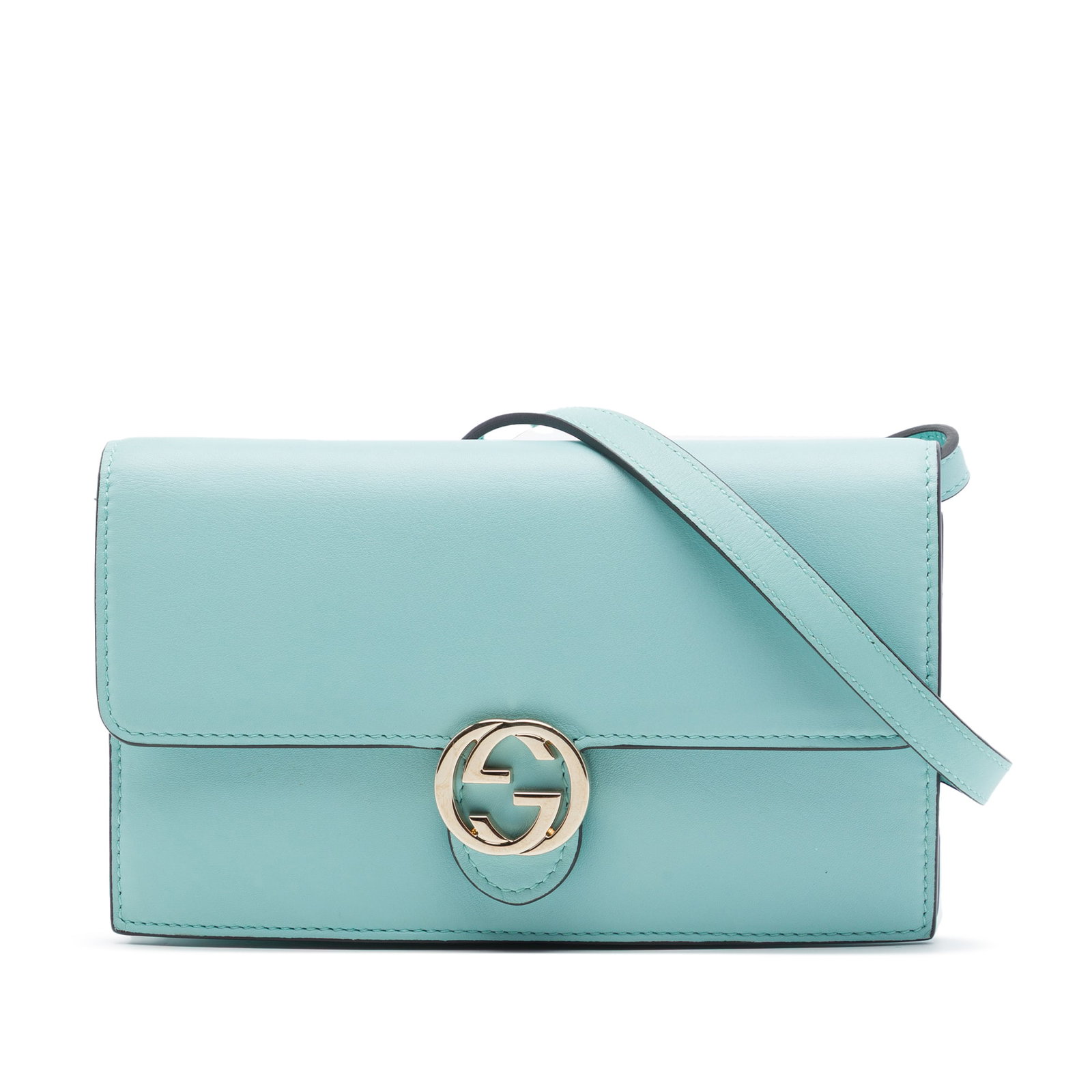 Gucci Interlocking G Dollar Wallet on Strap Blue Calfskin: Gucci Interlocking G Dollar Wallet on Strap Blue Calfskin A Gucci wallet on strap crafted in blue calfskin leather with the Interlocking G design. It features a flat leather shoulder strap, a front fl