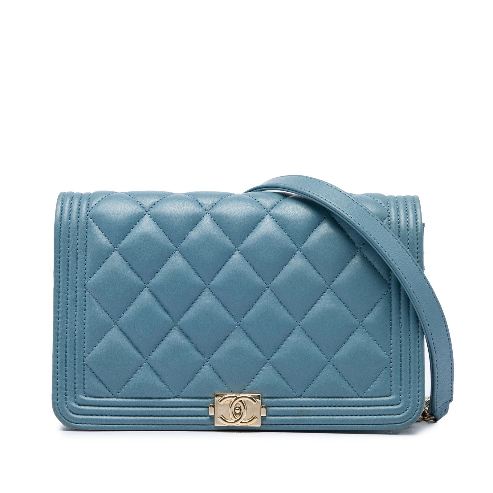 Chanel Boy Wallet On Chain blue quilted lambskin bag: Chanel Boy Wallet On Chain blue quilted lambskin bag A Chanel Boy Wallet on Chain crafted in blue quilted lambskin leather. This shoulder bag features a leather-woven chain strap, a front flap with in