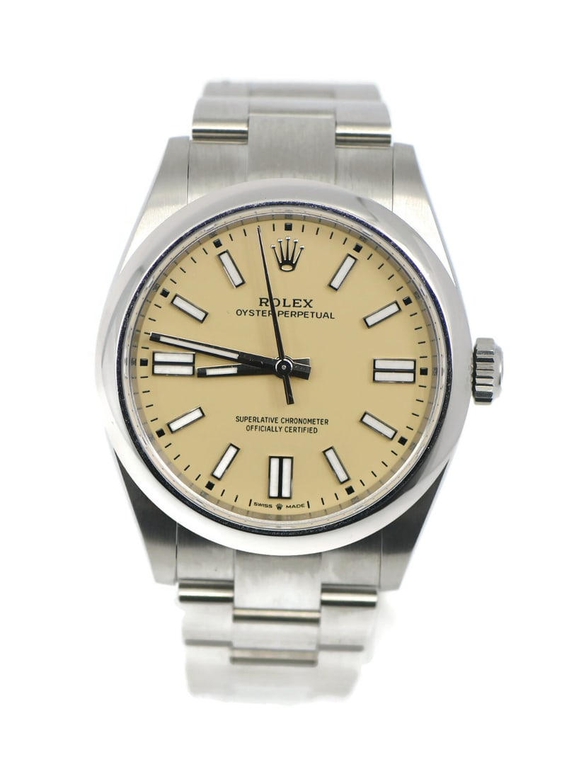 Rolex 134300 Oyster Perpetual 41mm beige dial wristwatch: Rolex 134300 Oyster Perpetual 41mm beige dial wristwatch Rolex Oyster Perpetual 41 wristwatch with a beige analog dial and stainless steel Oyster bracelet. This pre-owned automatic watch features a po