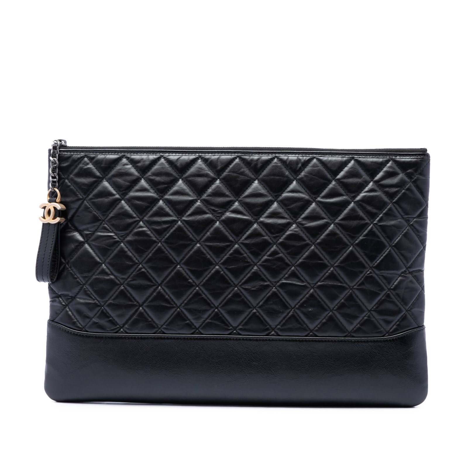 Chanel Gabrielle O Case Large Black Calfskin Zip Clutch: Chanel Gabrielle O Case Large Black Calfskin Zip Clutch A Chanel Gabrielle O Case clutch crafted in aged calfskin leather with a quilted body and top zip closure. Made in Italy, this large clutch come