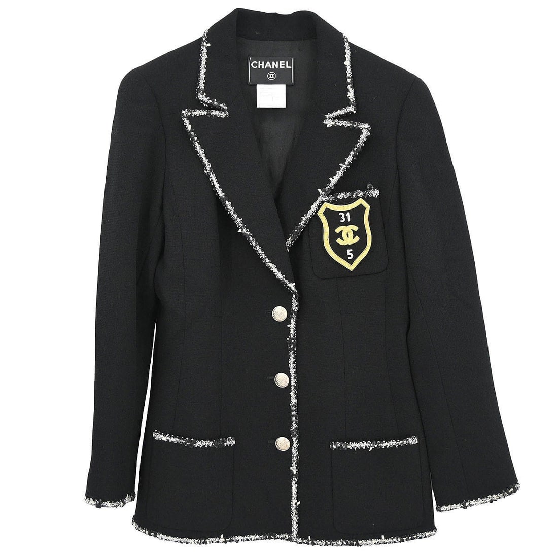 Black Wool Chanel Jacket Size 38 Logo Button Front: Black Wool Chanel Jacket Size 38 Logo Button Front Vintage Chanel single-breasted jacket in black wool with logo accents and a regular fit. This women's mid-length jacket features long sleeves, a butt