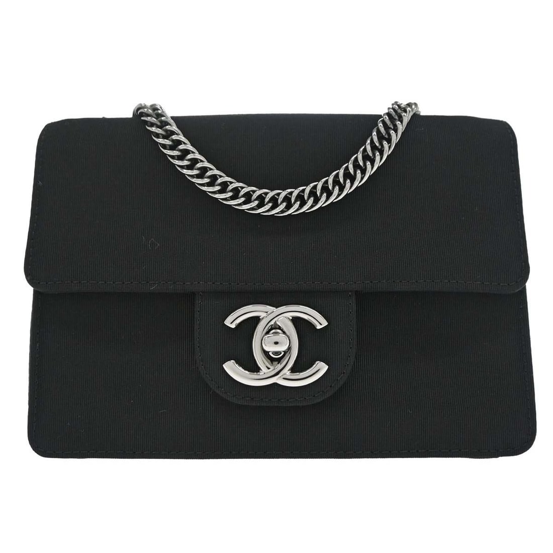Mini quilted canvas shoulder bag CHANEL Classic Single Flap black: Mini quilted canvas shoulder bag CHANEL Classic Single Flap black Chanel Classic Single Flap shoulder bag in black quilted canvas with a turn-lock closure and chain shoulder strap. This mini bag is ma
