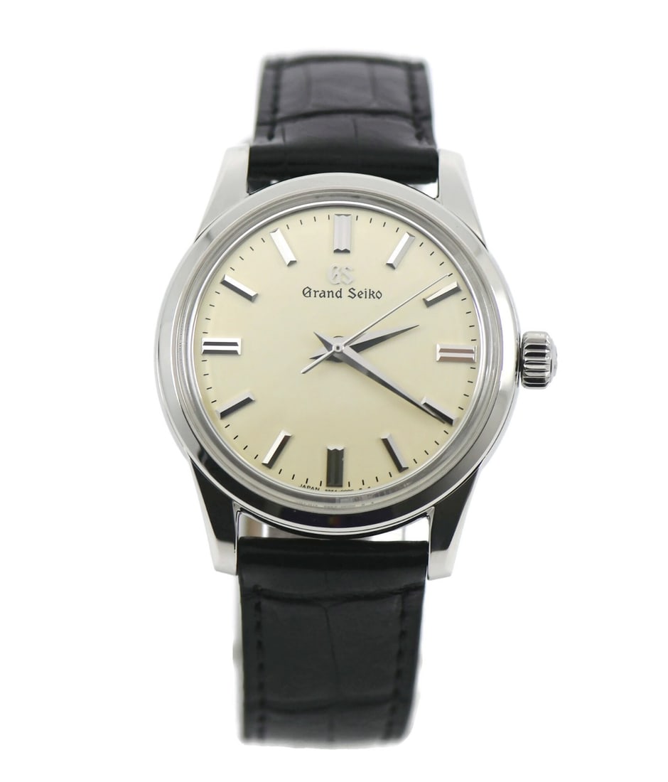 Grand Seiko SBGW231 Elegance manual watch with box papers: Grand Seiko SBGW231 Elegance manual watch with box papers Grand Seiko Elegance SBGW231 wristwatch with a polished stainless steel case, white analog dial, and black leather strap. This men's watch fea