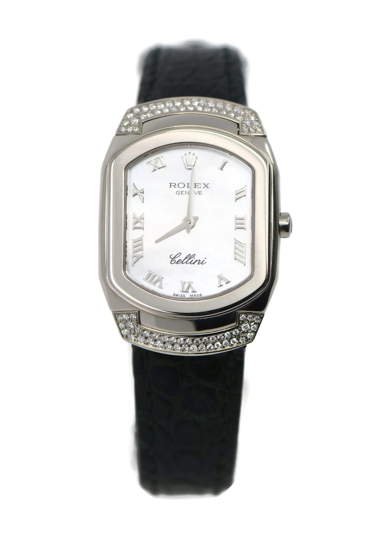 Rolex Cellini ref 6692 women's 18K white gold diamond wristwatch: Rolex Cellini ref 6692 women's 18K white gold diamond wristwatch Pre-owned Rolex Cellini wristwatch with a diamond bezel and silver analog dial with Roman numeral indices. This women's watch features 