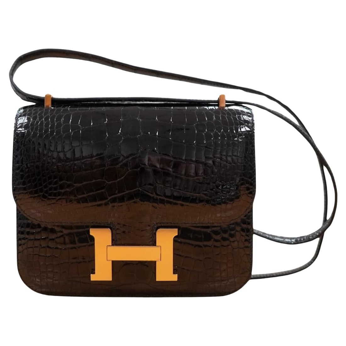 Hermes Constance black alligator shoulder bag rose gold hardware: Hermes Constance black alligator shoulder bag rose gold hardware Hermes Constance Bag from the Constance Collection in black shiny alligator with rose gold hardware. It features tonal stitching, an H 
