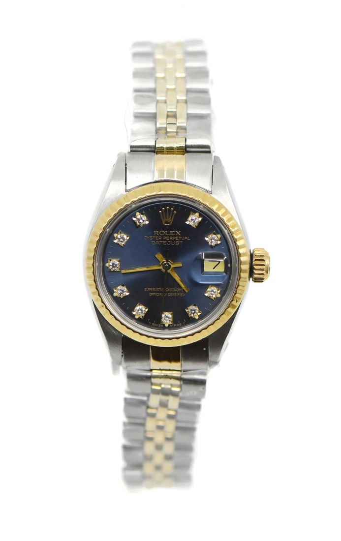 Rolex Datejust 6917 Ladies Wristwatch 18K and Stainless Steel: Rolex Datejust 6917 Ladies Wristwatch 18K and Stainless Steel Pre-owned Rolex Datejust wristwatch with a round analog display and a customized diamond bezel. This women's watch features a blue diamond