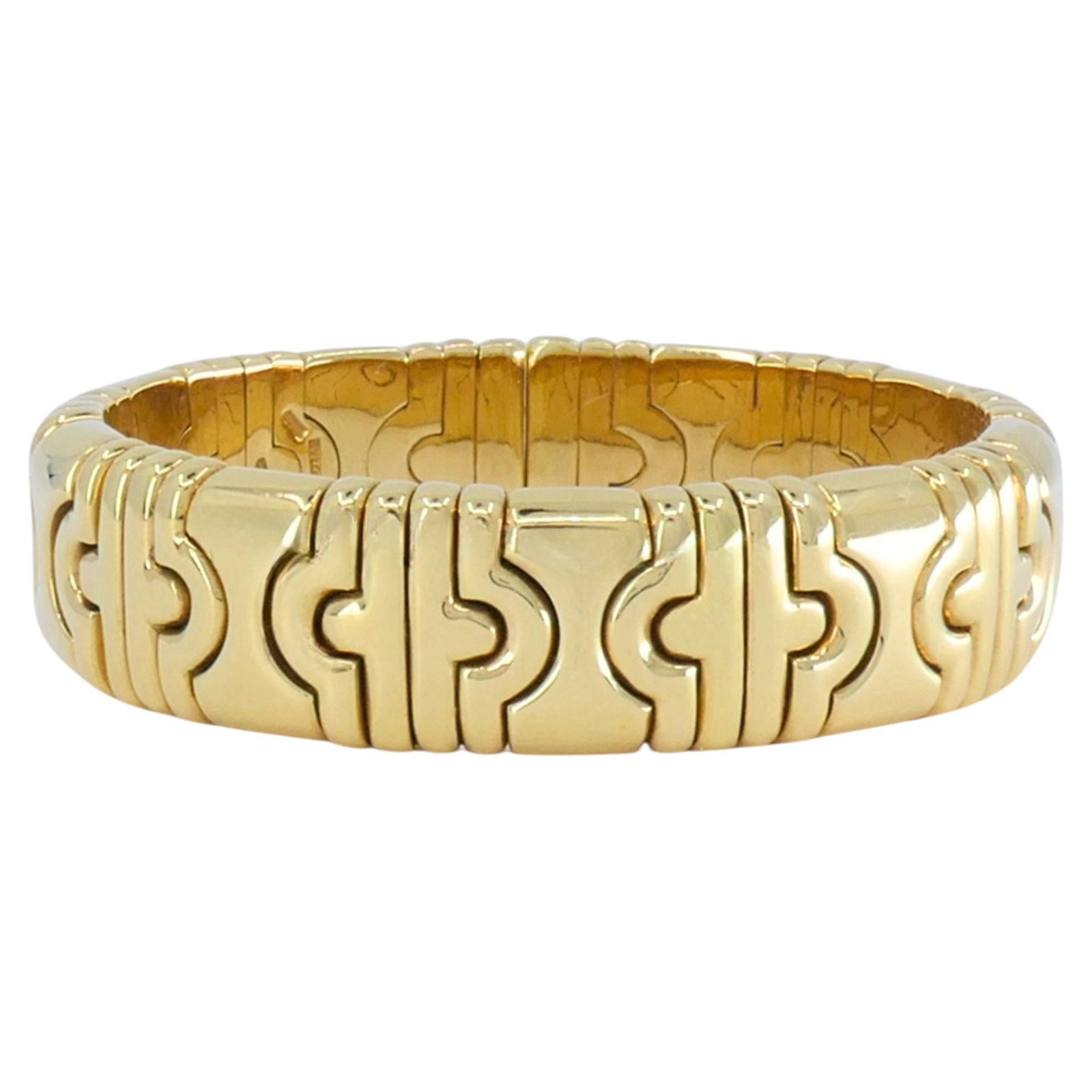 Bulgari Parentesi 18k Yellow Gold Small Cuff Bracelet: Bulgari Parentesi 18k Yellow Gold Small Cuff Bracelet Vintage Bulgari Parentesi cuff bracelet in 18k yellow gold, featuring the brand's iconic interlocking Parentesi motif in a continuous pattern arou