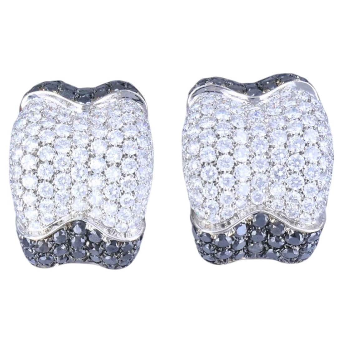 De Grisogono Diamond Hoop Earrings in 18k White Gold Pair: De Grisogono Diamond Hoop Earrings in 18k White Gold Pair A pair of De Grisogono hoop earrings crafted in 18k white gold and set with round white and black diamonds. The earrings feature a pave settin