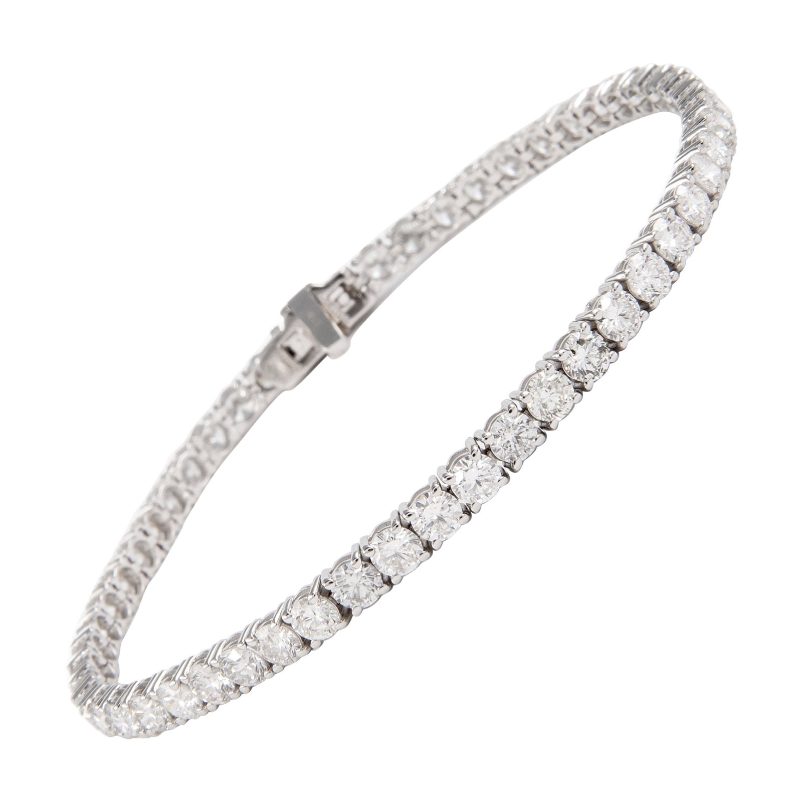 Diamond Tennis Bracelet 6.83ct 18k White Gold: Diamond Tennis Bracelet 6.83ct 18k White Gold Diamond tennis bracelet set with 53 round brilliant diamonds totaling 6.83 ct, approximately D-F color and SI1 clarity, in 18k white gold. This modern bra