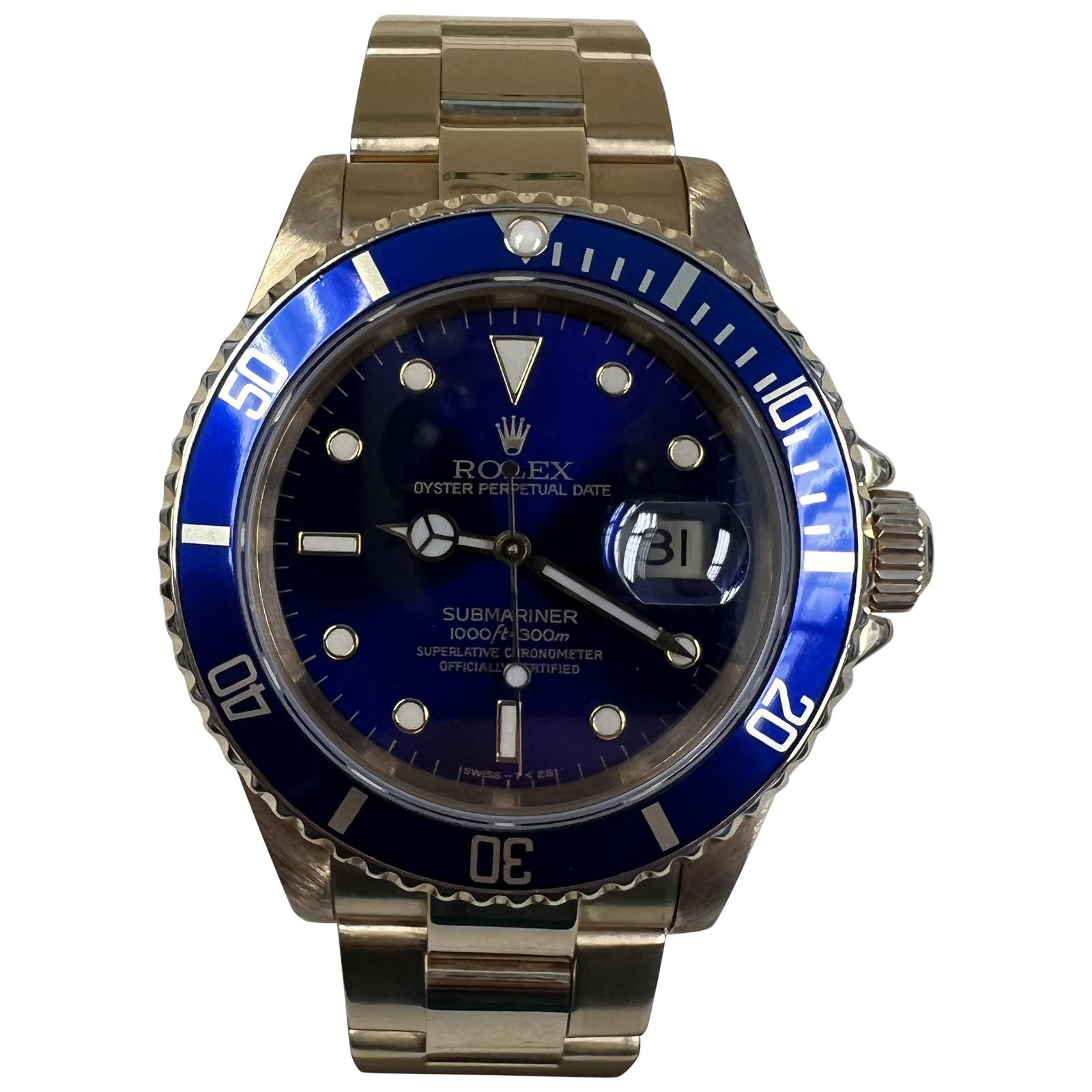 Rolex 16618 Submariner Date 40mm 18k Yellow Gold Watch with Service Papers: Rolex 16618 Submariner Date 40mm 18k Yellow Gold Watch with Service Papers Rolex Submariner Date reference 16618 with a highly desirable violet/tropical dial and blue bezel. This automatic wristwatch 