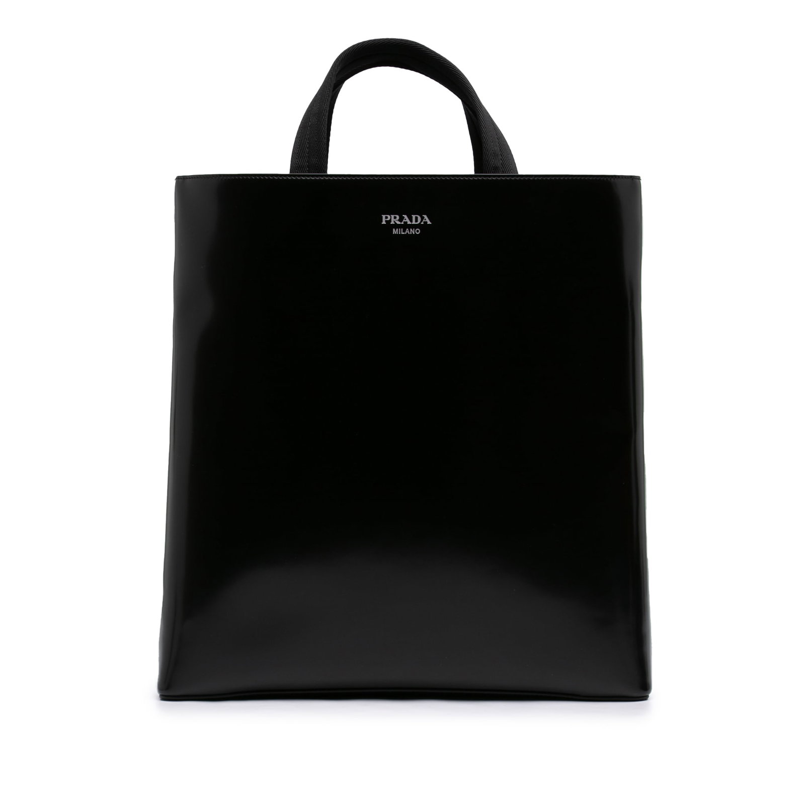 Prada Spazzolato black leather tote bag: Prada Spazzolato black leather tote bag Prada Spazzolato Leather Tote in black brushed leather with flat handles, an open top, and an interior zip pocket. Includes dust bag. Condition AB with noted we