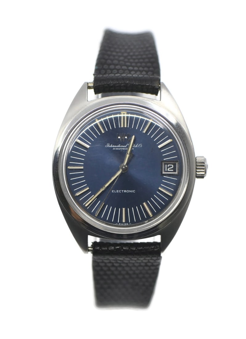IWC Electronic men's wristwatch blue dial leather strap steel case: IWC Electronic men's wristwatch blue dial leather strap steel case Pre-owned IWC Electronic men's wristwatch with an analog blue dial, stainless steel case, and leather band. This Swiss-made watch is 