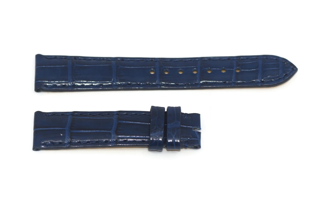 Breitling 18mm Blue Leather Two Piece Watch Band: Breitling 18mm Blue Leather Two Piece Watch Band Pre-owned Breitling two-piece wristwatch strap in blue leather, designed for men's watches. Made in Switzerland and compatible with Breitling watches. 