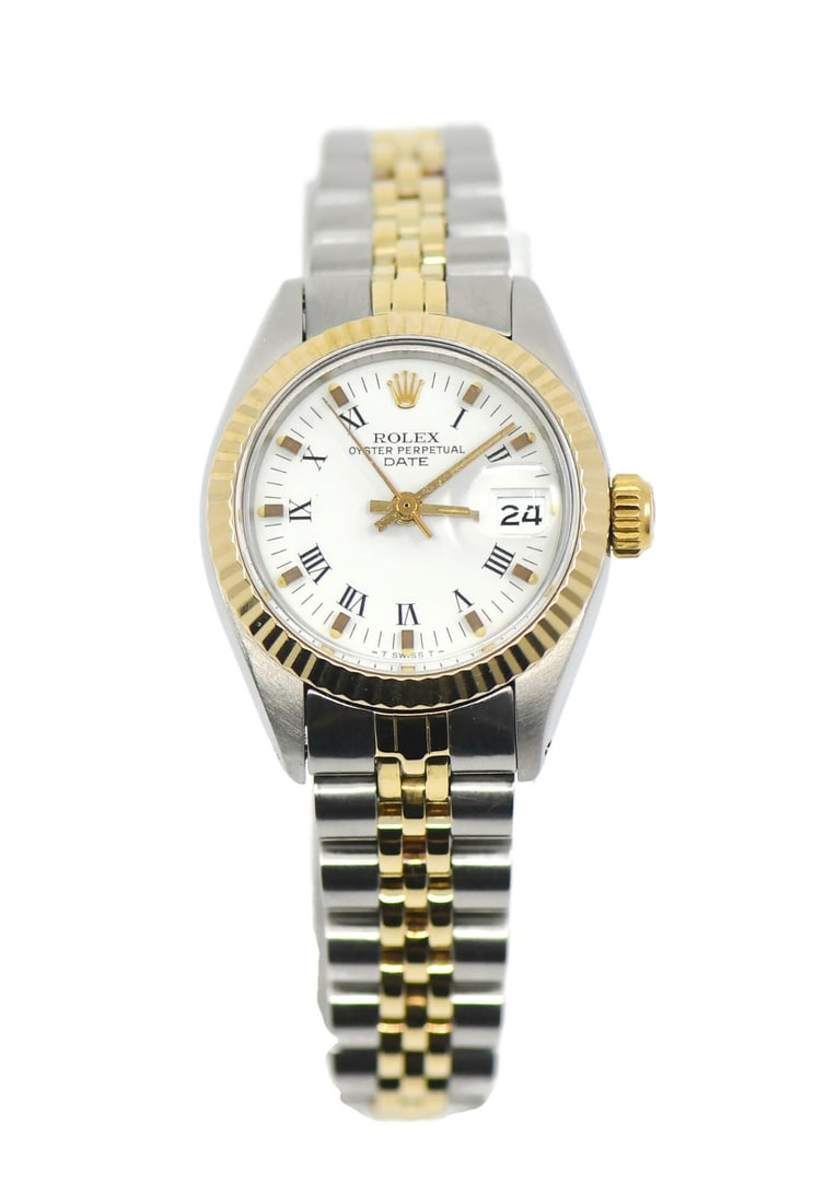 Rolex Oyster Perpetual Date 26mm White Dial 1981 Box: Rolex Oyster Perpetual Date 26mm White Dial 1981 Box This Rolex Oyster Perpetual Date wristwatch features a 26 mm stainless steel case with 18K accents and a white analog dial. Designed for women, it 