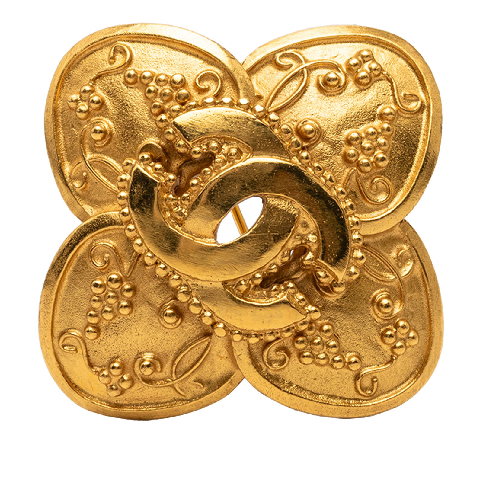 Chanel Grapevine Clover CC Gold Tone Brooch: Chanel Grapevine Clover CC Gold Tone Brooch A Chanel CC Grapevine Clover brooch crafted in gold-plated metal with a back pin closure. This costume jewelry piece is made in France and includes the box.