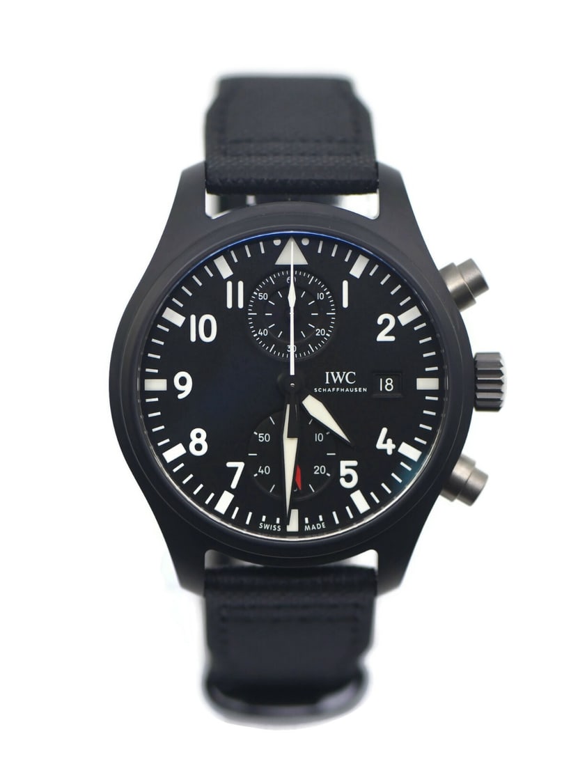 IWC Pilot Top Gun Chronograph Ceramic Watch IW389001 with Box and Papers: IWC Pilot Top Gun Chronograph Ceramic Watch IW389001 with Box and Papers The IWC Pilot Top Gun Chronograph Ceramic Watch IW389001 is a sophisticated timepiece designed for aviation enthusiasts. This w