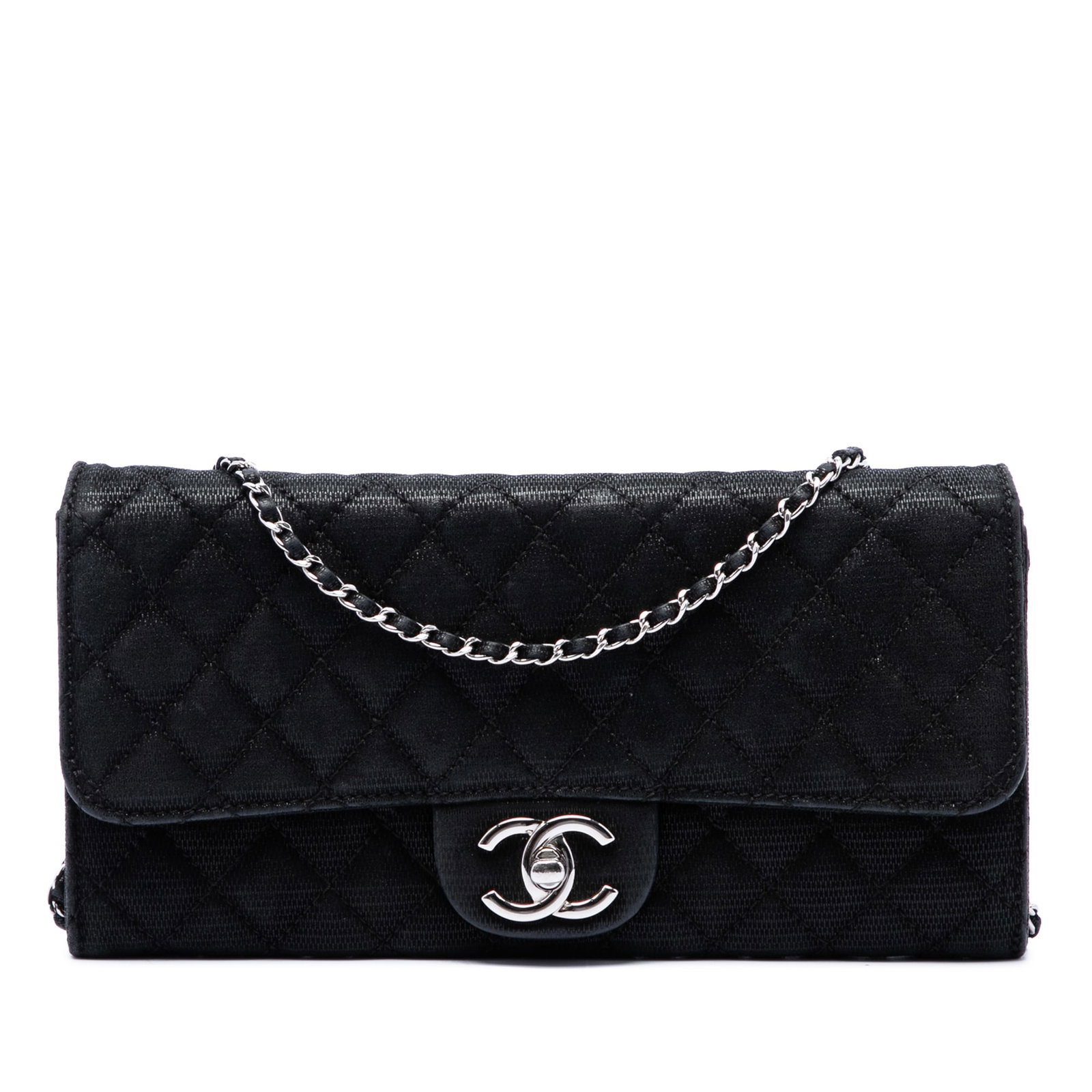 Chanel East West Flap Bag Quilted Iridescent Fabric CC: Chanel East West Flap Bag Quilted Iridescent Fabric CC A Chanel East West flap bag in black iridescent quilted fabric with the iconic CC twist-lock closure. This shoulder bag features a leather-woven 