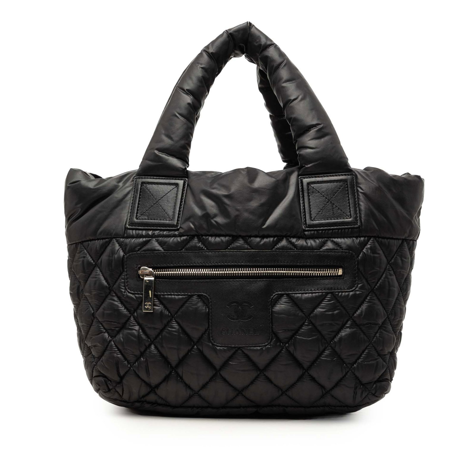 Chanel Coco Cocoon Small Tote Quilted Nylon Black Bag: Chanel Coco Cocoon Small Tote Quilted Nylon Black Bag A Chanel Small Quilted Nylon Coco Cocoon tote in black with a softly structured silhouette and practical everyday design. It features a quilted ny