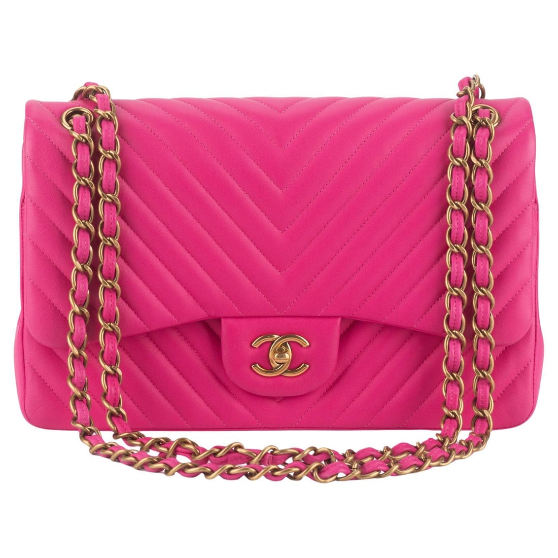 Chanel Pink Chevron Quilted Lambskin Classic Double Flap Bag: Chanel Pink Chevron Quilted Lambskin Classic Double Flap Bag Introducing the Chanel Pink Chevron Classic Double Flap, a timeless piece crafted from luxurious quilted lambskin leather. This medium-size