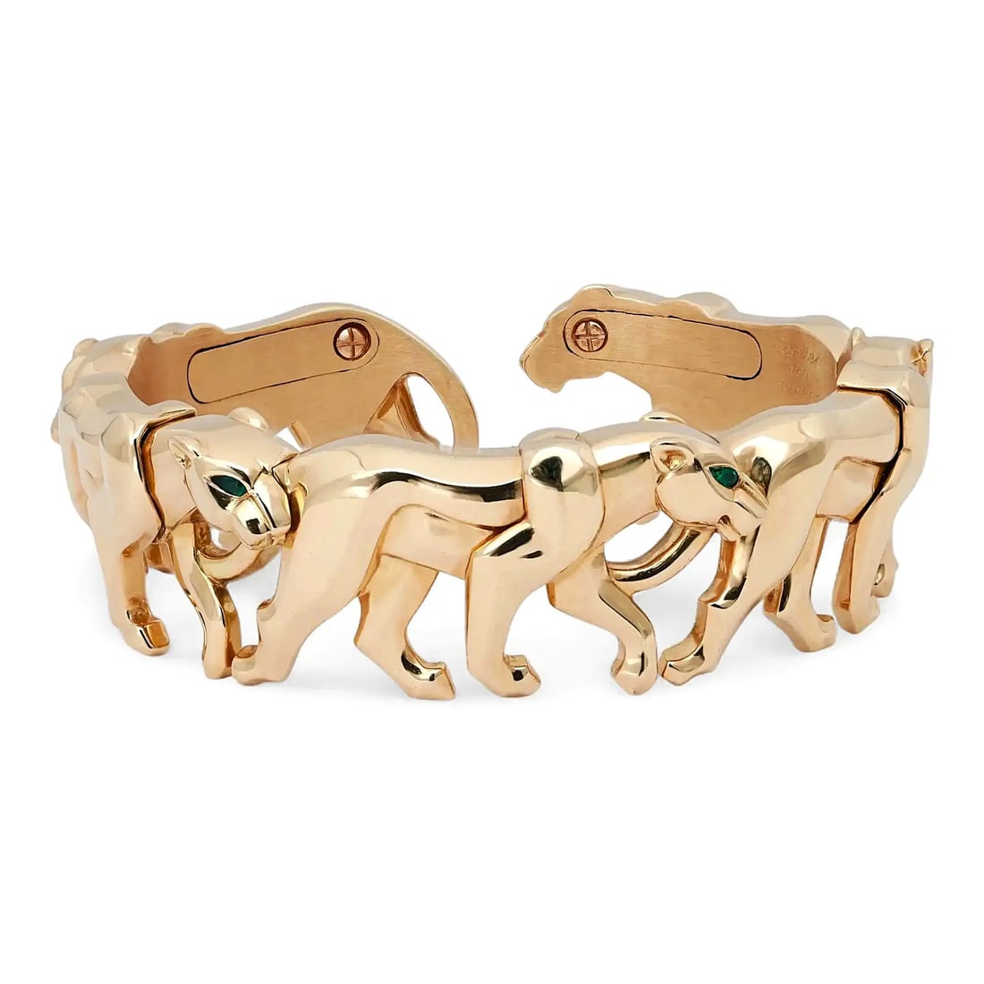 Cartier Nakoura Pantheres Cuff Bracelet in 18K Yellow Gold: Cartier Nakoura Pantheres Cuff Bracelet in 18K Yellow Gold Striking Cartier Nakoura cuff bracelet featuring a sprung design with five walking pantheres, each set with a single pear-shaped green tsavor