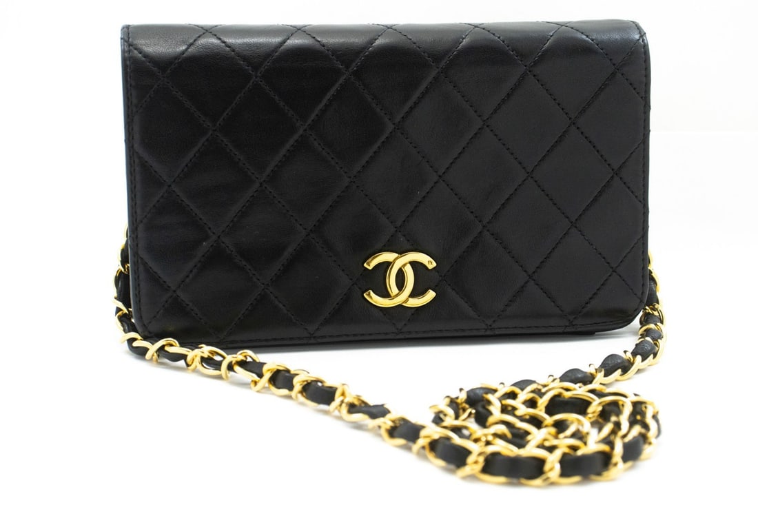 Chanel Vintage Full Flap Black Lambskin Shoulder Bag: Chanel Vintage Full Flap Black Lambskin Shoulder Bag A Chanel Vintage Full Flap bag in black quilted lambskin leather. Made in France, this piece is presented in good condition with light wear to the 